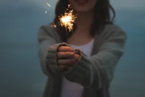 Girl holding firework